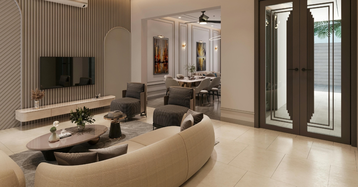 Sala de estar luxuosa exibindo um porcelanato para sala marmorizado de grande formato, substituindo a pedra natural com elegância e brilho.